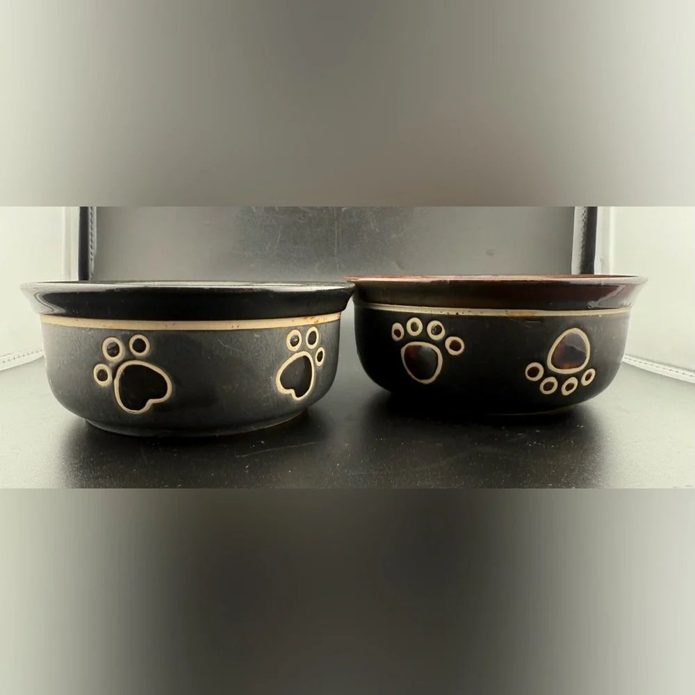 2 small dog dishes. Chic tiger print and bone print. 5”